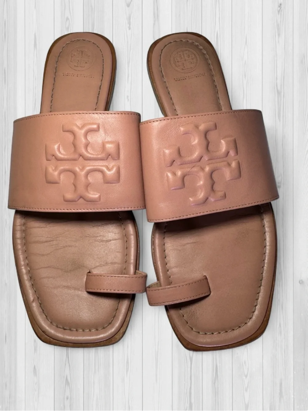Tory Burch Nude Rose Leather Cutout Logo Toe-Ring Sandals.